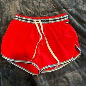 Andrew Christian Low-Rise swim shorts.
